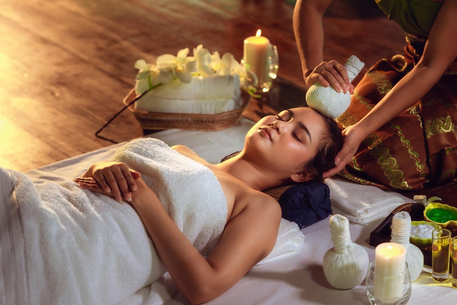 Guest relaxing during a spa treatment at The One Family Spa